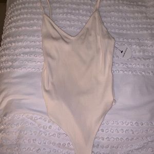 Lulu’s Cream Ribbed Bodysuit